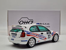 Lade das Bild in den Galerie-Viewer, Toyota Corolla WRC White Tour De Corse 2000 &#39;&#39;Sebastian Loeb&#39;&#39;
