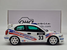 Lade das Bild in den Galerie-Viewer, Toyota Corolla WRC White Tour De Corse 2000 &#39;&#39;Sebastian Loeb&#39;&#39;
