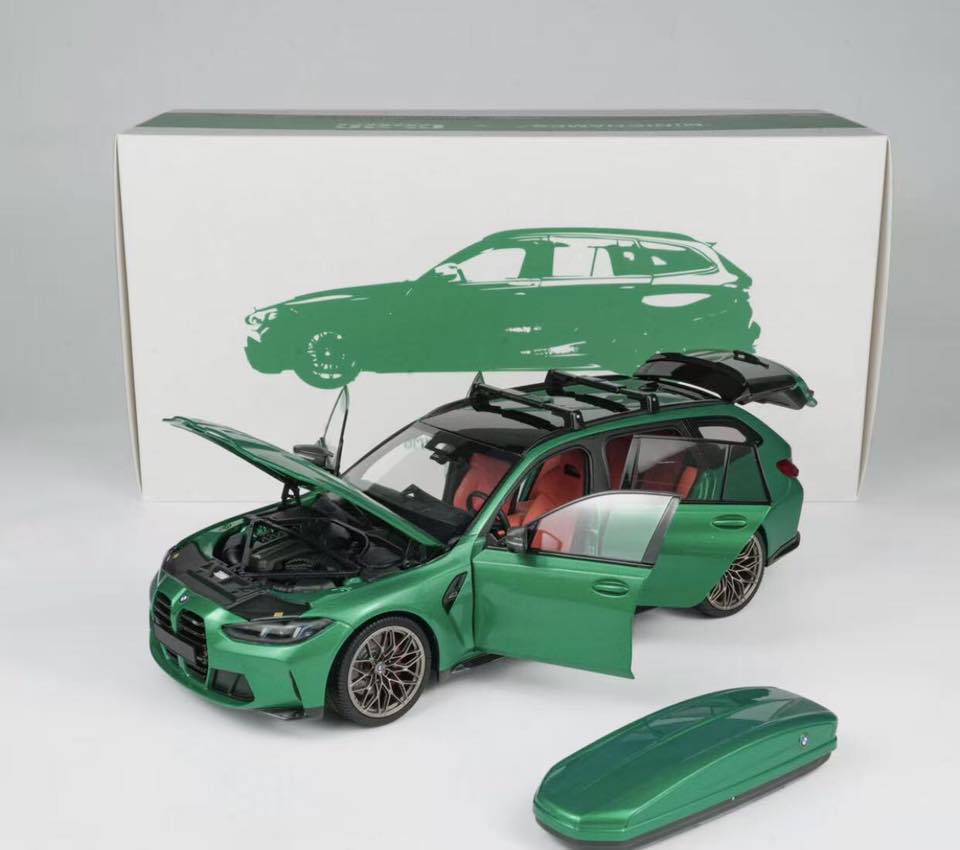 BMW M3 Touring Grün mit Dachbox